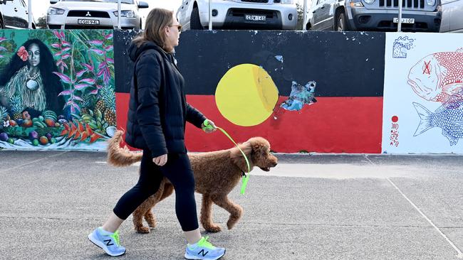 The Aboriginal Flag is painted on the beach promenade. Picture: NCA NewsWire / Jeremy Piper