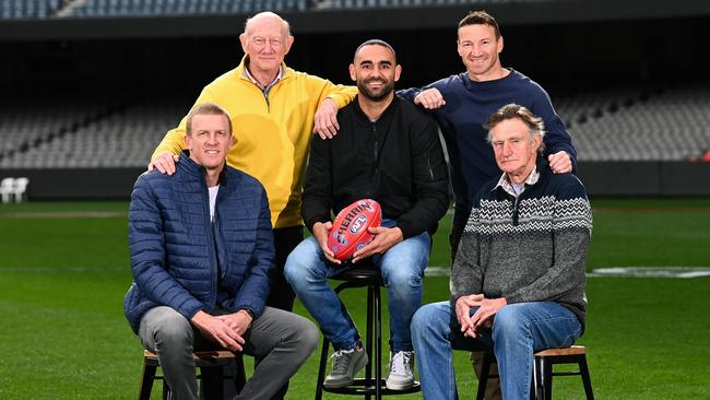 MELBOURNE, AUSTRALIA - JULY 02: Dustin Fletcher, Kevin Bartlett, Shaun Burgoyne, Brent Harvey and Michael Tuck pose together during a media opportunity at Marvel Stadium on July 02, 2021 in Melbourne, Australia. Shaun Burgoyne this weekend will become the 5th player to have played 400 VFL/AFL games along with Brent Harvey, Michael Tuck, Kevin Bartlett and Dustin Fletcher. (Photo by Quinn Rooney/Getty Images)