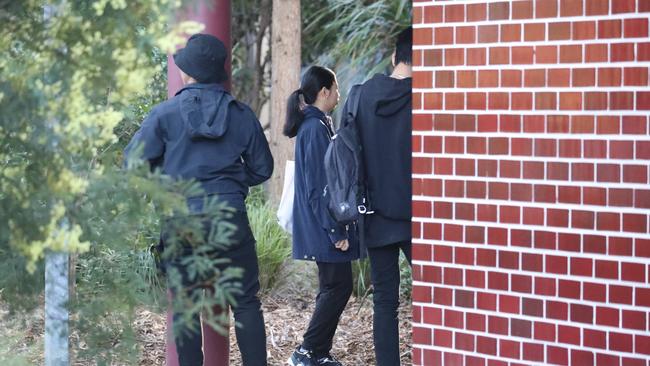 Cleaning crews arrived at the school on Thursday morning.