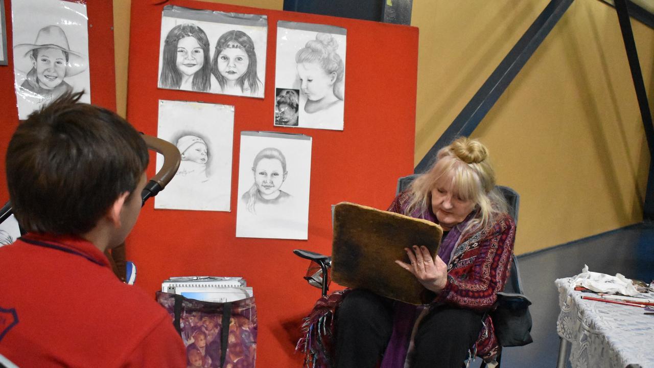 Rozanna Donovan working on pencil portraits at the Gatton Show on Friday, July 21. Picture: Peta McEachern