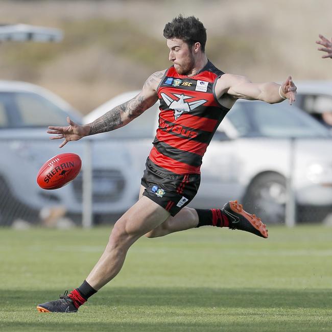 Ryan Wiggins kicks forward against North Hobart. Picture: PATRICK GEE