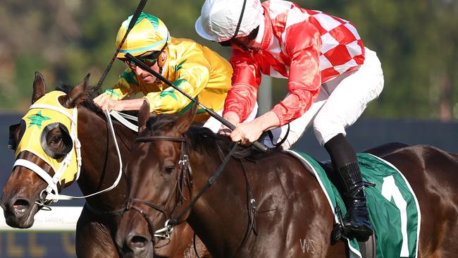 James McDonald wins aboard Orchestral in the Group 1 Vinery Stud Stakes before having some words with Nash Rawiller on Tutta La Vita. Picture: Jeremy Ng/Getty Images