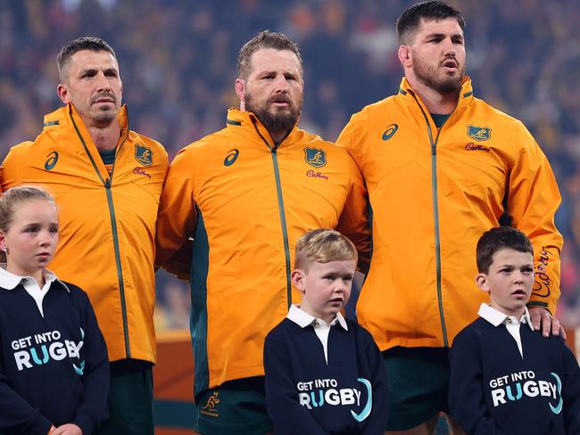 SYDNEY, AUSTRALIA - JULY 06: (L-R) Andrew Kellaway, Jake Gordon, James Slipper and Liam Wright of the Wallabies sing the national anthem during the men's International Test match between Australia Wallabies and Wales at Allianz Stadium on July 06, 2024 in Sydney, Australia. (Photo by Cameron Spencer/Getty Images)