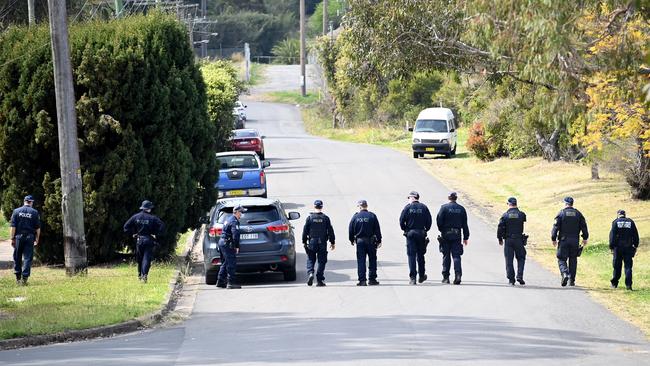 Police search the streets at the crime scene in 2021. Picture: Jeremy Piper