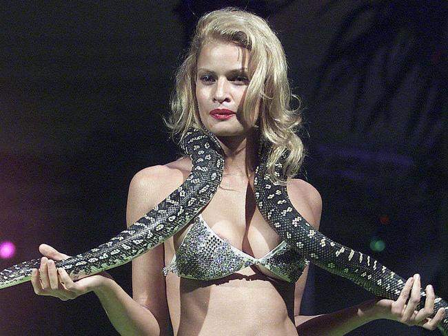 MAY 7, 2001 : Model Kristy Hinze with python around her neck, is wearing diamond-encrusted bikini in Tigerlily range by designer Jodie Packer on first day of Australlian Fashion Week at Fox Studios in Sydney, 07/05/01. Pic Brett Costello.Animal / SnakeF/LSwimwear