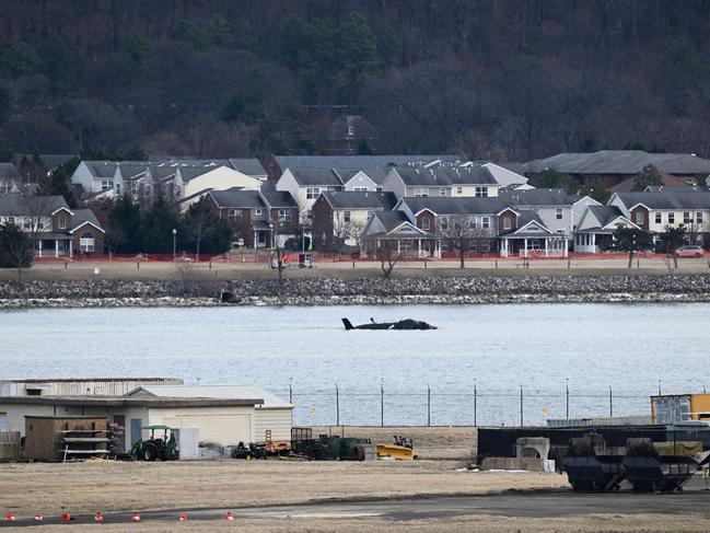 Part of the wreckage lies in the Potomac River after the crash. Picture: AFP