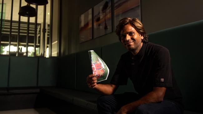 Fannie Bay Cool Spot chef Krishna Bhubthi cools down while waiting for the power to come back on. Picture: Che Chorley