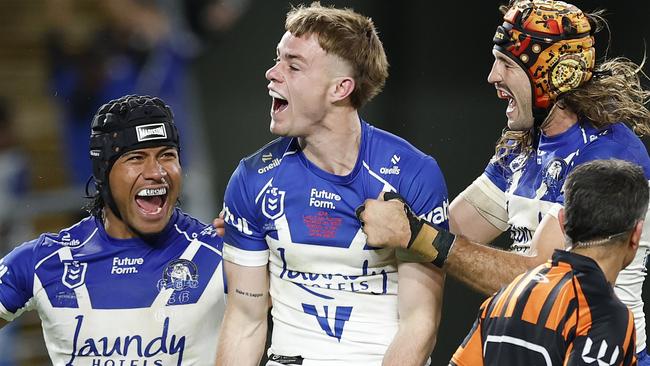 SYDNEY, AUSTRALIA - JUNE 09: Lachlan Galvin of the Bulldogs celebrates a try with team mates during the round 14 NRL match between Canterbury Bulldogs and Parramatta Eels at Accor Stadium, on June 09, 2025, in Sydney, Australia. (Photo by Darrian Traynor/Getty Images)