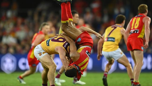 Lachie Neale and Touk Miller tangle in the QClash. Picture: Albert Perez/AFL Photos via Getty Images