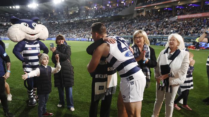 GEELONG, AUSTRALIA - MAY 10: Tom Hawkins of the Cats embrace family and friends before the round nine AFL match between Geelong Cats and Port Adelaide Power at GMHBA Stadium, on May 10, 2024, in Geelong, Australia. (Photo by Darrian Traynor/Getty Images)