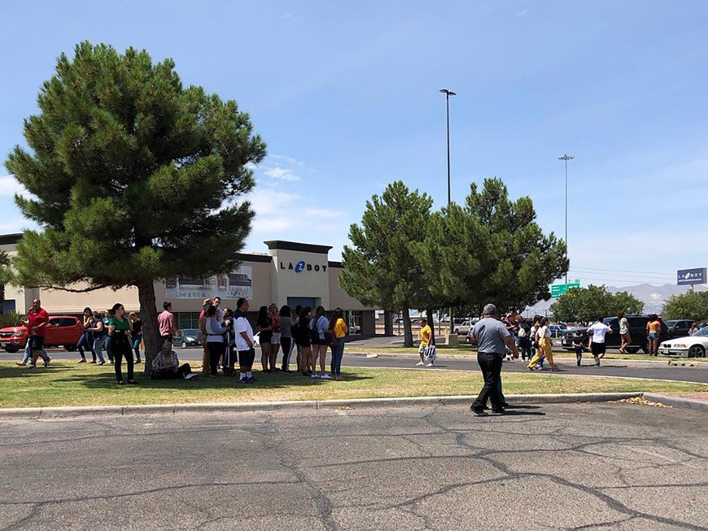 People stand outside the Cielo Vista Mall after the shooting in El Paso, Texas. Picture: AFP