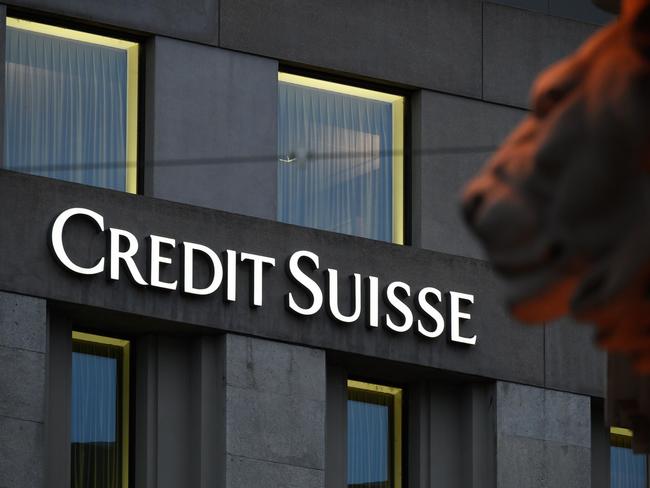 (FILES) In this file photo taken on November 04, 2020, shows a branch of Switzerland's second largest bank Credit Suisse in Geneva. - Swiss banking giant Credit Suisse paid $600 million to financial guarantee insurer MBIA to settle long-running litigation connected to the US subprime mortgage crisis, MBIA announced on February 12, 2021. The agreement follows a ruling by a New York judge in favor of MBIA in the case concerning Credit Suisse's representations to the company, which provided insurance for residential-backed securities ahead of the 2008 financial crisis. (Photo by Fabrice COFFRINI / AFP)