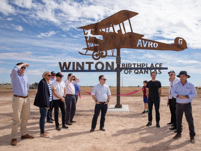 Qantas boss Alan Joyce, centre, hit the Outback to mark 100 years of Qantas.