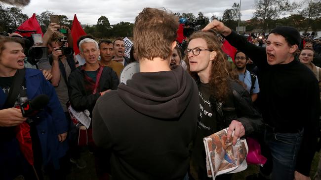 Protesters clash with Milo supporter outside of the event. Picture: Toby Zerna