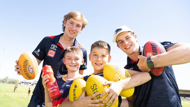 Adelaide Crows players Max Michalanney and Billy Dowling with footy fans Charlie Kregar and Bode Gates, both 10, at Berri Oval, Berri, Erawirunga, February 7, 2023. Picture: Morgan Sette