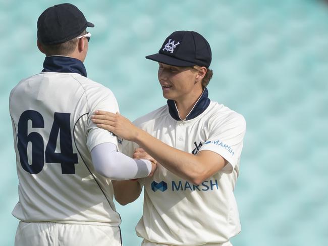 Wil Parker of Victoria (right) celebrates with Peter Siddle after taking the wicket of Kurtis Patterson of the Blues during day 2 of the Marsh Sheffield Shield match between the NSW Blues and Victoria at the SCG in Sydney, Saturday, February 15, 2020. (AAP Image/Craig Golding) NO ARCHIVING, EDITORIAL USE ONLY, IMAGES TO BE USED FOR NEWS REPORTING PURPOSES ONLY, NO COMMERCIAL USE WHATSOEVER, NO USE IN BOOKS WITHOUT PRIOR WRITTEN CONSENT FROM AAP