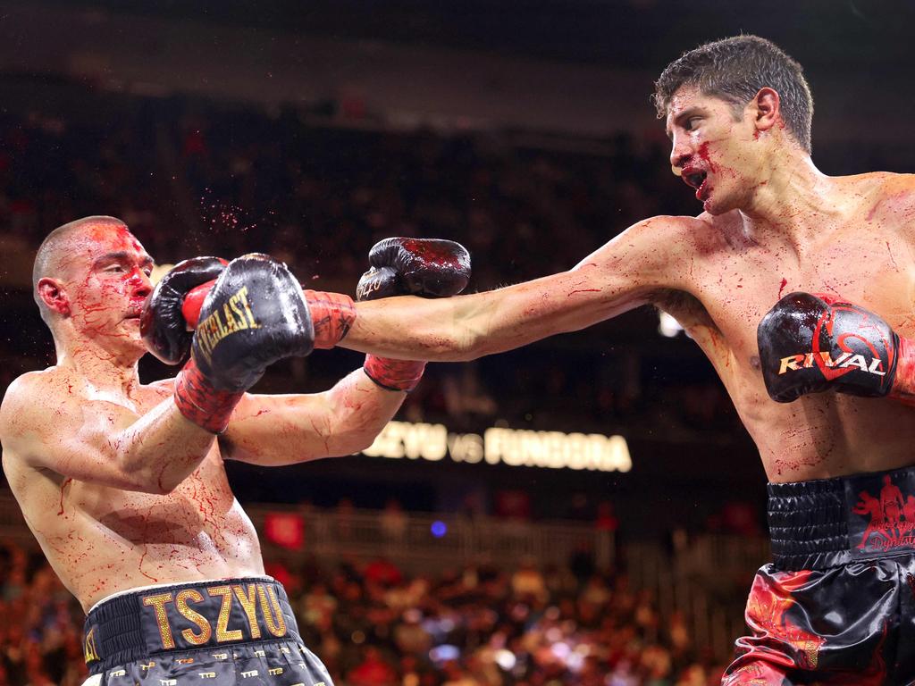 A bloodied Tim Tszyu put on one of Australian sport’s most heroic performances to last 12 rounds. Picture: Getty Images