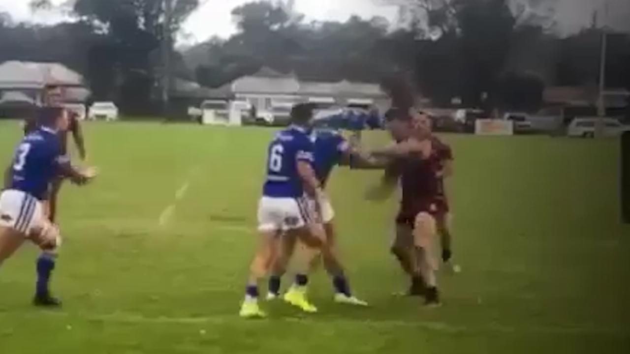 Curtis Scott in a bush footy brawl.