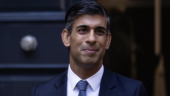 New Conservative Party leader and incoming prime minister Rishi Sunak waves as he leaves the Conservative Party Headquarters earlier today. Picture: Getty Images