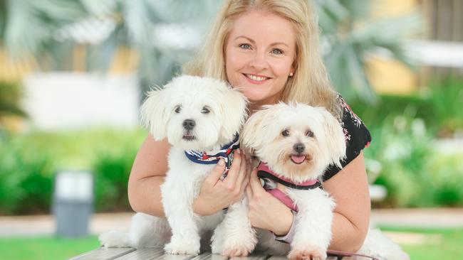 Barbara Baugh with her beloved malteses Baxter and Bella.