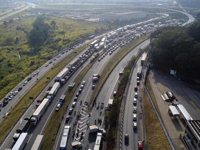 Truckers block the federal highway to protest rising fuel costs, in Embu das Artes, on the outskirts of Sao Paulo, Brazil. Picture: Andre Penner