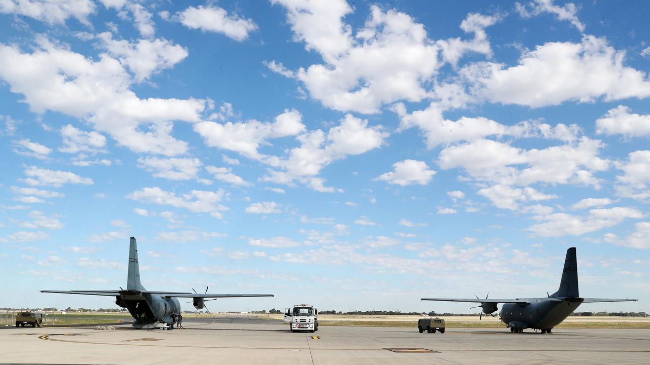 C-27J Spartan planes sit on the tarmac as they wait for supplies in Adelaide. Picture: Sarah Reed/Getty Images