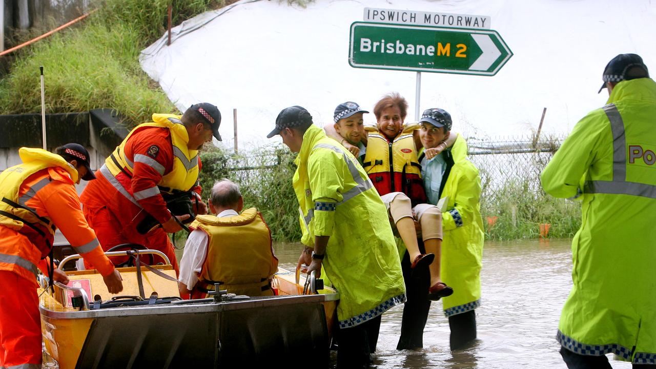 Flood rescue crews at work rescuing Goodna resident Maureen Evans on Woogaroo St, Goodna on Tuesday afternoon. Photo: Sarah Harvey/ The Queensland Times IPS110111GOOD12L