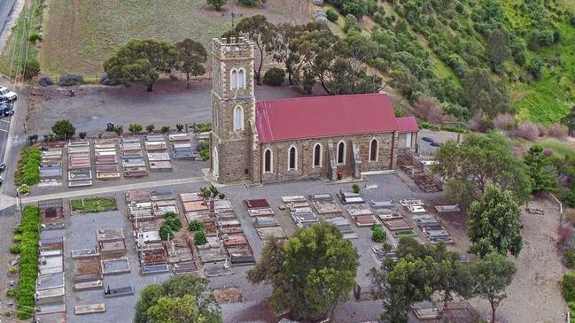 An aerial shot of the church and surrounding cemetery before the 2018 sale.