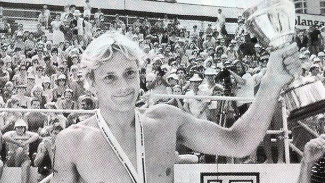 1984 Coolangatta Gold winner Guy Leech with his medal and trophy at Coolangatta beach. Pic: Supplied