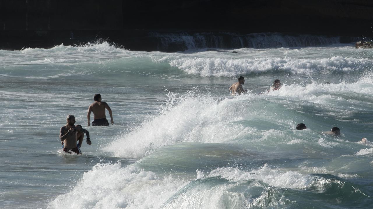 Beach goers enjoy the sun at Bronte as warm weather continues nearly 2 months into autumn. NewsWire / Simon Bullard.
