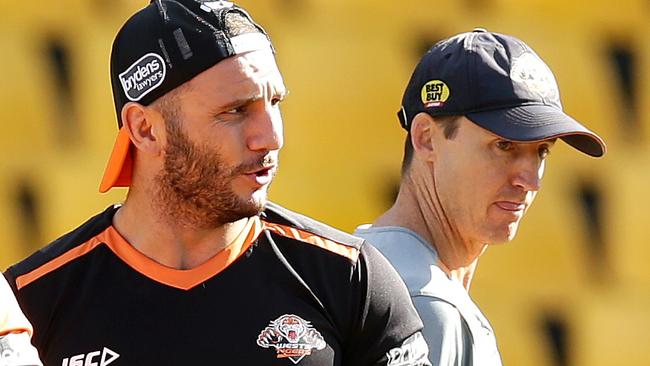 Robbie Farah and coach Jason Taylor during Wests Tigers training. Picture: Gregg Porteous