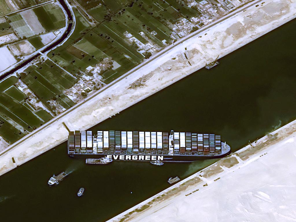 The owners of a giant container vessel blocking the Suez Canal said they faced "extreme difficulty" refloating it. Picture: AFP