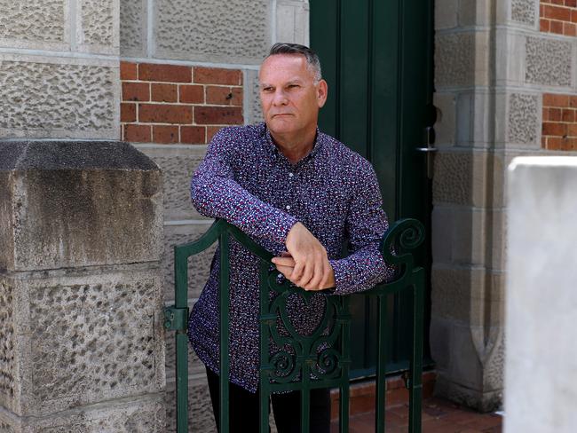 Eileen Walsh’s great-grandson stands at Boggo Road Gaol. Picture AAP/David Clark