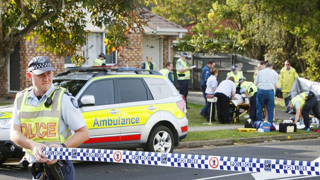 Emergency crews at the scene of the Redbank Plains crash in 2012. Picture: David Nielsen