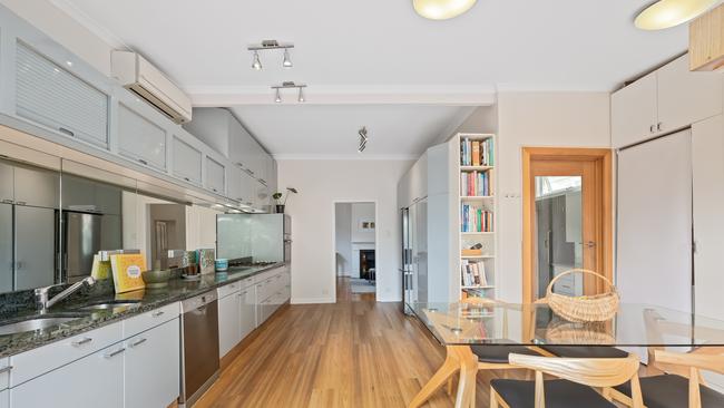 The large, entertainer’s kitchen and dining area.