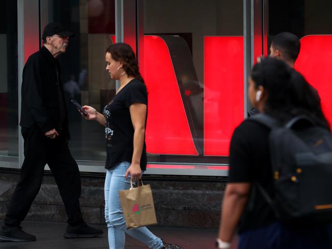 SYDNEY, AUSTRALIA - MARCH 26: Pedestrians move past a Westpac Bank in the central business district (CBD) on March 26, 2025 in Sydney, Australia. The budget is expected to return to deficit after two years of surplus, focusing on cost-of-living relief measures, including extended electricity rebates and increased healthcare spending, while also addressing economic challenges and potential voter concerns ahead of the upcoming federal election. (Photo by Lisa Maree Williams/Getty Images)