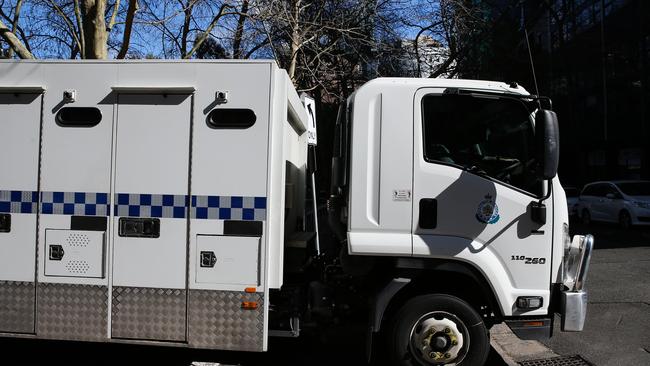 A view of the the tick transferring convicted murderer Chris Dawson as he leaves Surry Hills Police Station. Picture NCA Newswire/ Gaye Gerard.