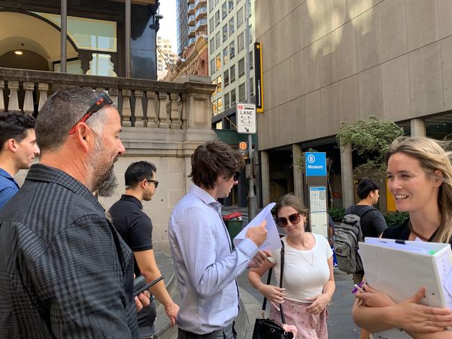 Harland leaves court with his family and lawyer. Picture: Joanna Panagopoulos