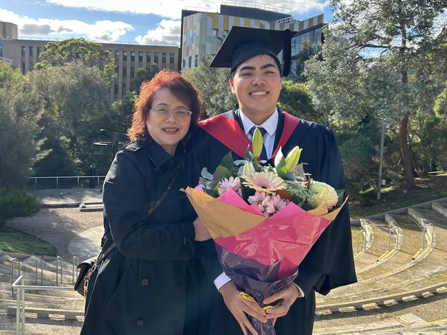 Jason Liu, with Jian Jin, graduates with a Bachelor of Nursing from La Trobe University on May 14, 2024. Picture: Brittany Busch.