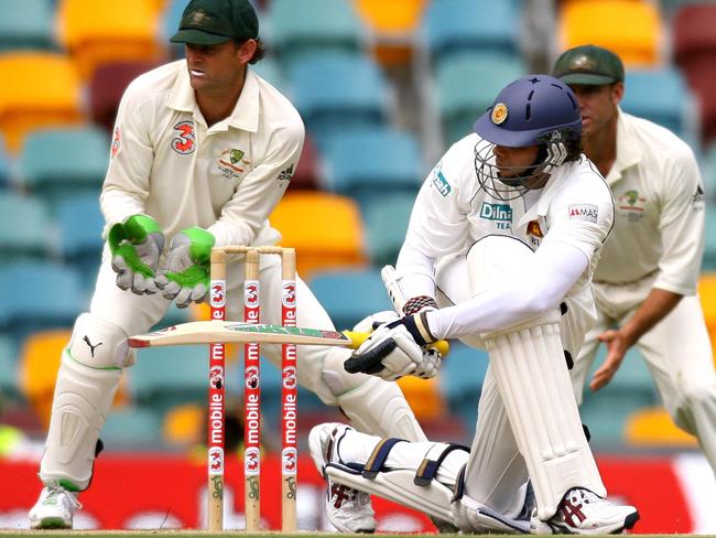 Michael Vandort sweeps for Sri Lanka against Australia at the Gabba. He’s joined Clyde.