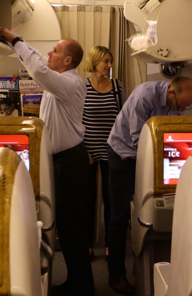 Reporter Tara Brown, Nine director of news and current affairs Darren Wick and producer Stephen Rice safely on board an Emirates flight headed home. Picture: News Corp/Liam Kidston.