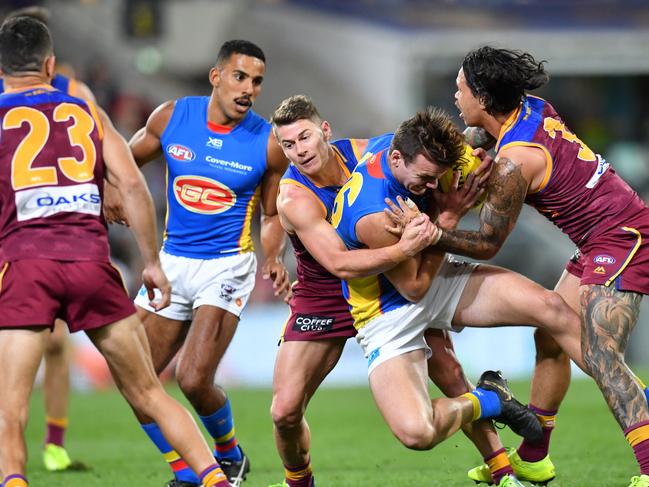 Lions dominated Suns in the QClash. (AAP Image/Darren England)