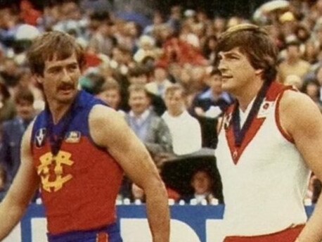 Bernie Quinlan and Barry Round with their 1981 Brownlow Medals.