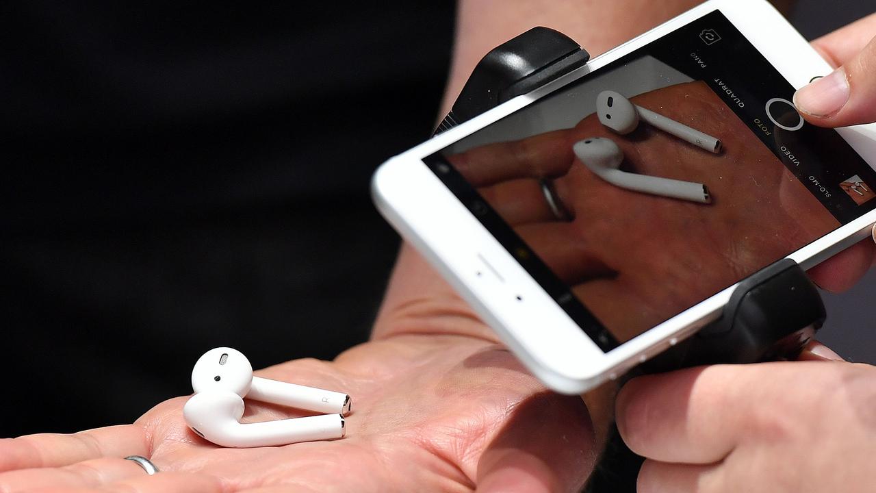 The wireless listening devices retail for $219 for a pair. Picture: AFP PHOTO / Josh Edelson.