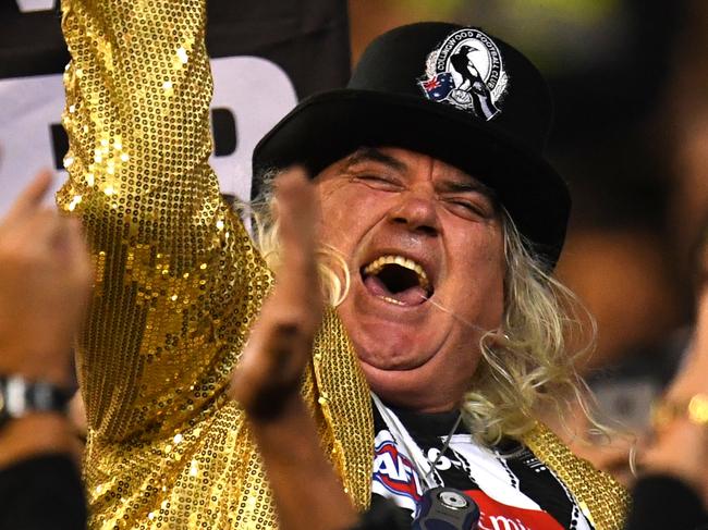 Corfe was Collingwood’s number one fan and led its cheer squad. Picture: AAP