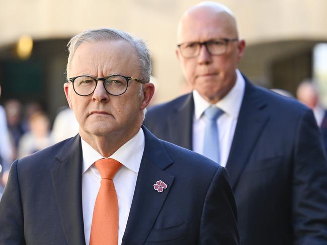 CANBERRA, AUSTRALIA  - NewsWire Photos - February 3, 2025:  Prime Minister Anthony Albanese and Leader of the Opposition Peter Dutton during the last post ceremony at the Australian War Memorial in Canberra. Picture: NewsWire / Martin Ollman