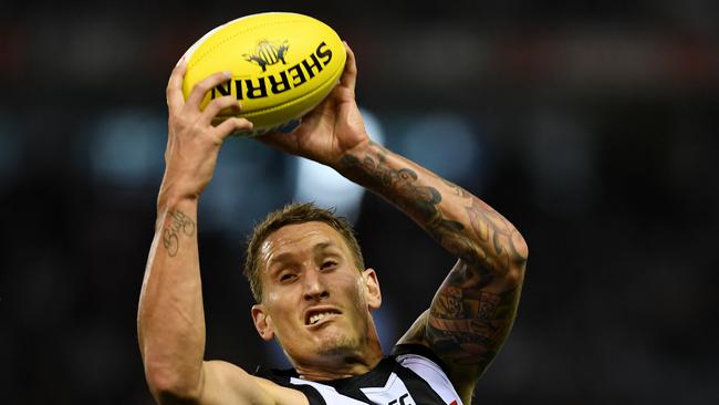 Brent Macaffer playing for Collingwood.