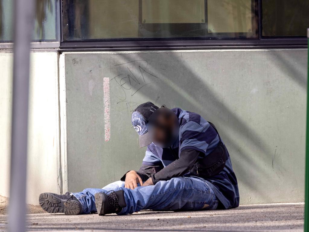 A man seen nodding off before falling backwards outside the supervised injecting centre in Richmond. Picture: NCA NewsWire / David Geraghty