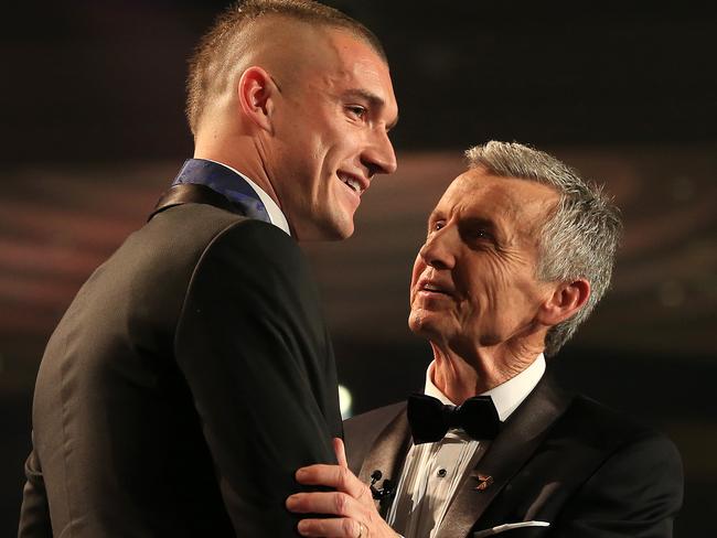 Channel 7 host Bruce McAvaney congratulates Brownlow medallist Dustin Martin. Picture: Mark Stewart