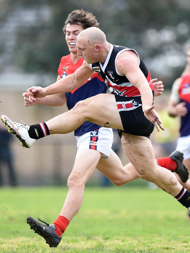 Bonbeach champ Shane McDonald kicks one of his four first-quarter goals against Mt Eliza. Picture: Jason Sammon.